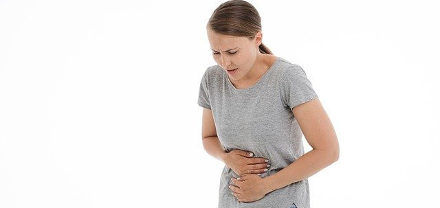 woman with stomach pain from constipation